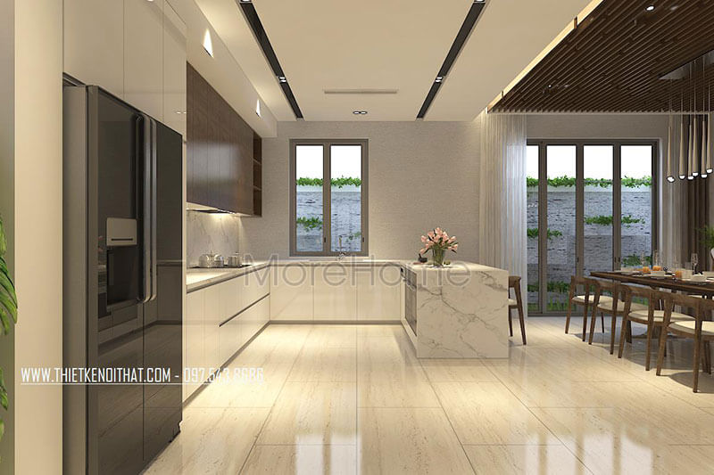 Khu vực bếp được thiết kế hiện đại với tông màu trắng mang đến sự sạch sẽ và ấm cúng tạo nguồn cảm hứng cho những món ăn ngon Thiết kế phòng bếp