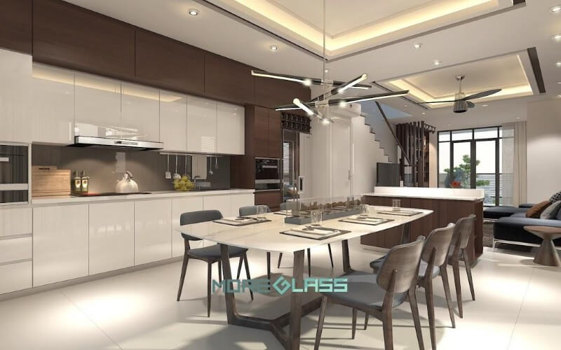 Trang trí nội thất phòng bếp liền phòng ăn hiện đại, sang trọng lấy tông màu trắng và ghi làm chủ đạo tạo cảm giác dễ chịu, thoải mái.