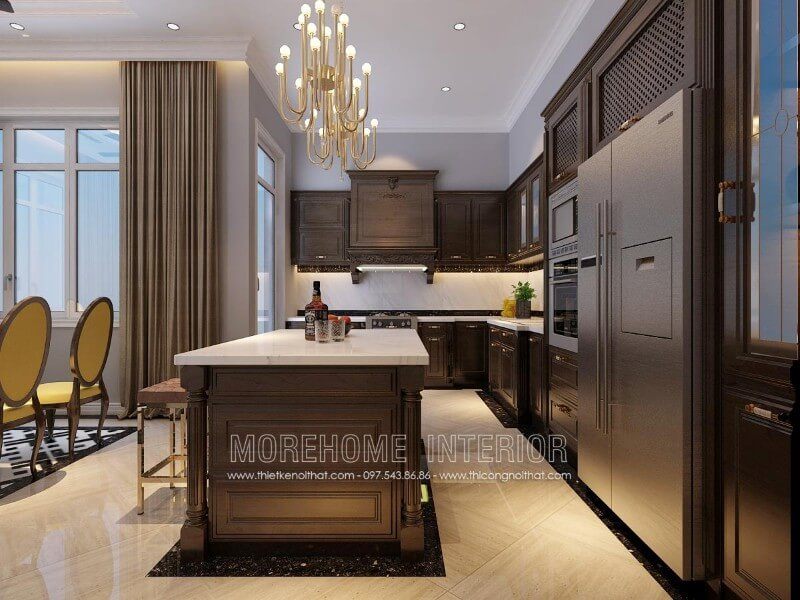 Mẫu thiết kế tủ bếp gỗ óc chó tại Hà Nội phong cách tân cổ điển với những đường nét hoa văn chạm khắc đầy tinh tế, không quá cầu kỳ nhưng vẫn mang lại vẻ đẹp nổi bật khác biệt riêng với cổ điển truyền thống hay hiện đại trẻ trung